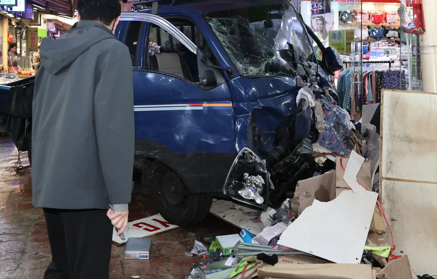 Truck hits pedestrians in South Korea market, killing 2 people and injuring 18