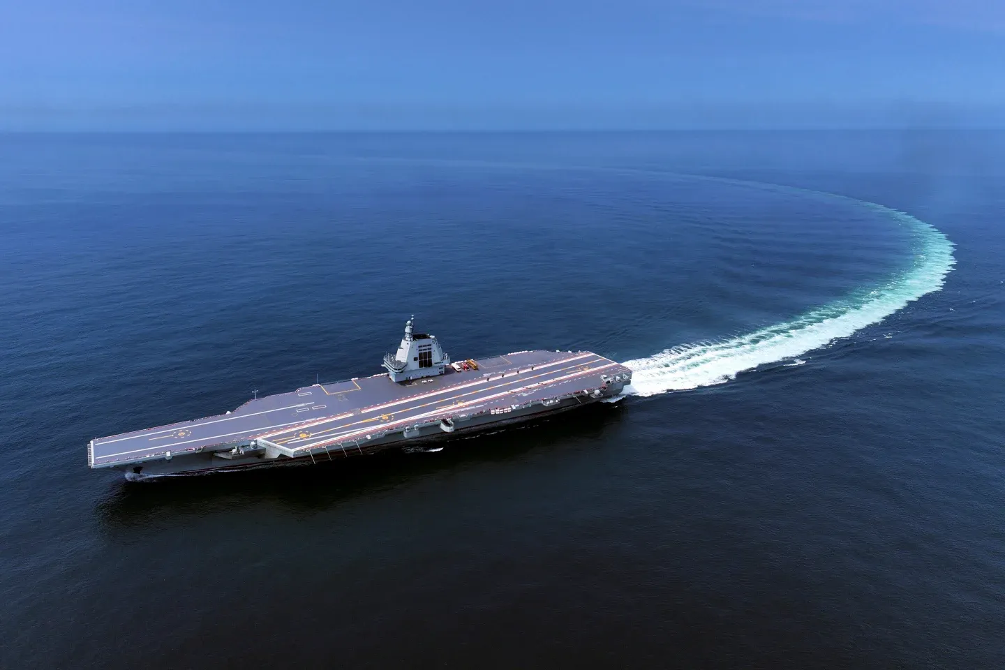 China commissions new aircraft carrier as it seeks to extend power far from its coast
