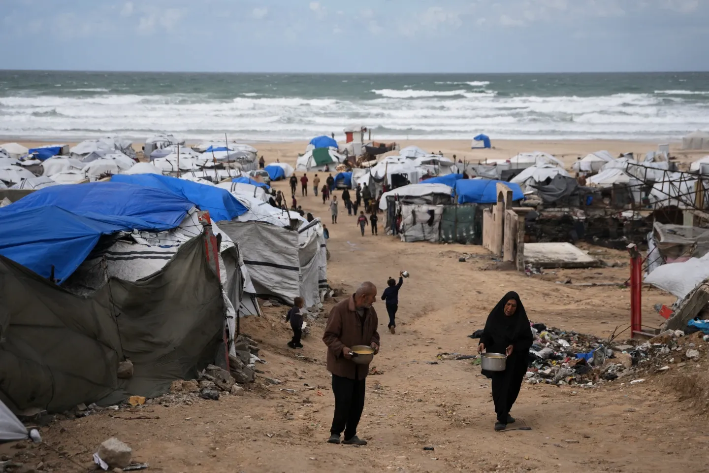 Winter rain floods Gaza camps as Netanyahu heads for US meeting