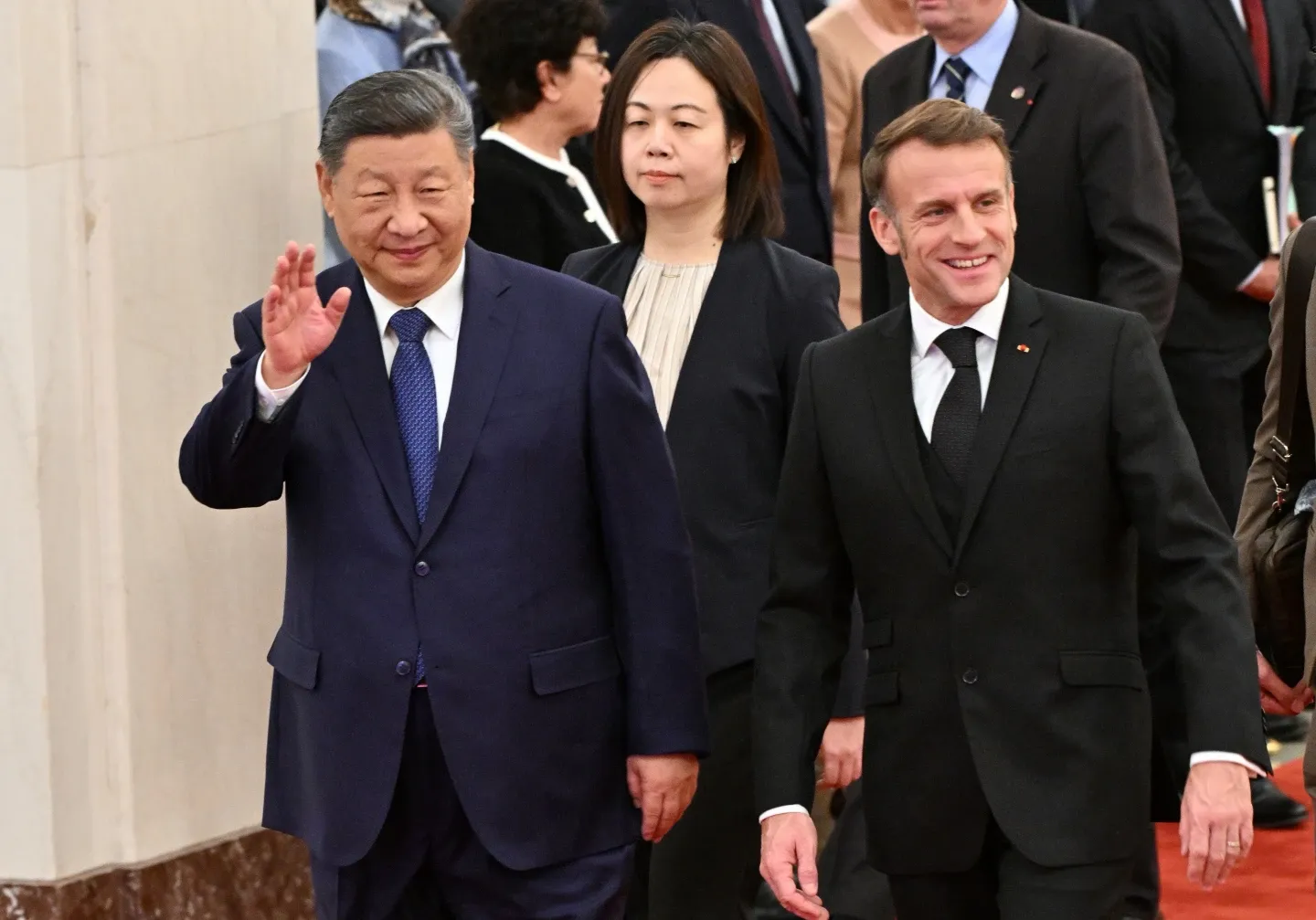 China’s Xi and France’s Macron pledge cooperation on global crises and trade