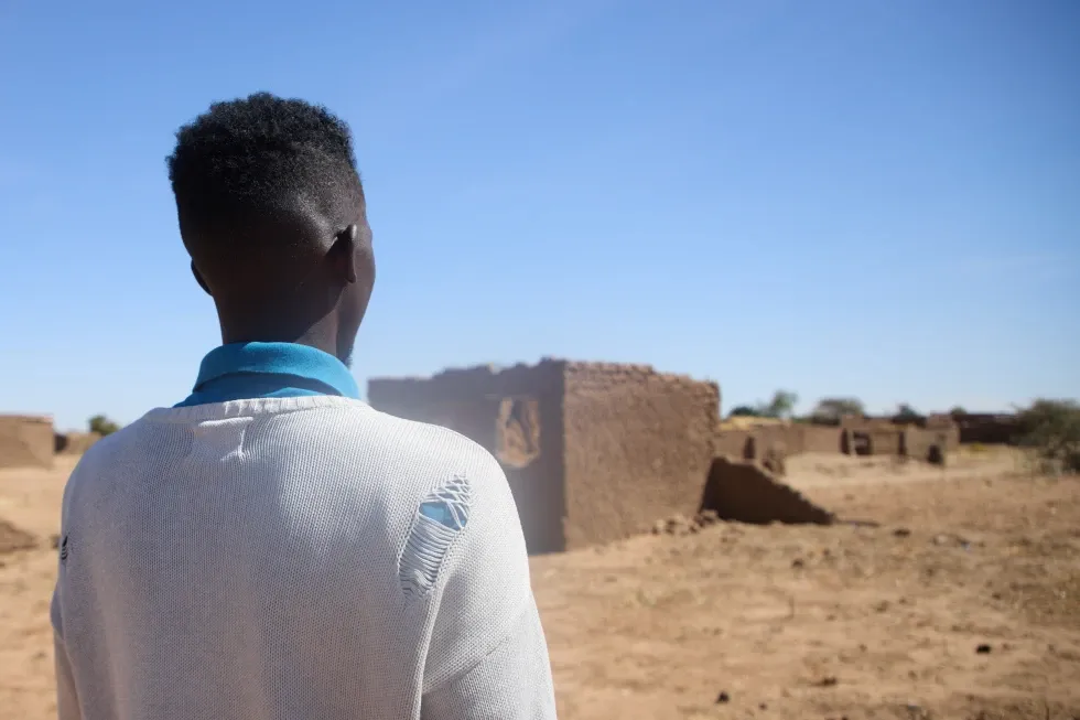 A Sudanese doctor recounts his harrowing escape from a Darfur city under rebel bombardment