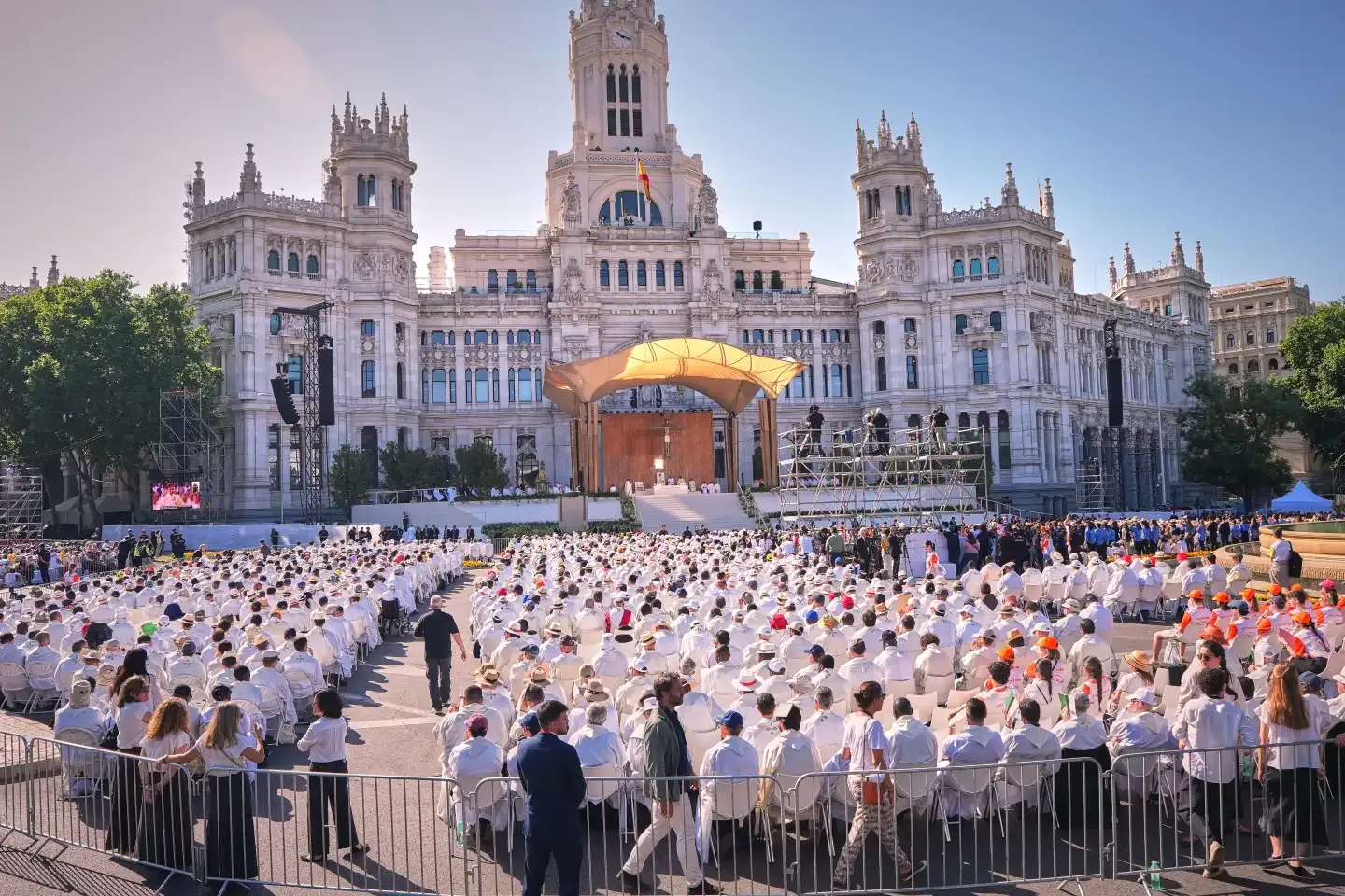 1 million people flood Madrid streets to see the pope’s flower-carpeted procession