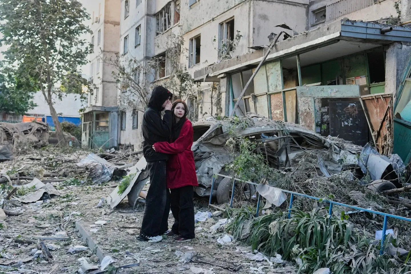 Russian attack on Ukraine kills at least 11 and traps others in damaged buildings