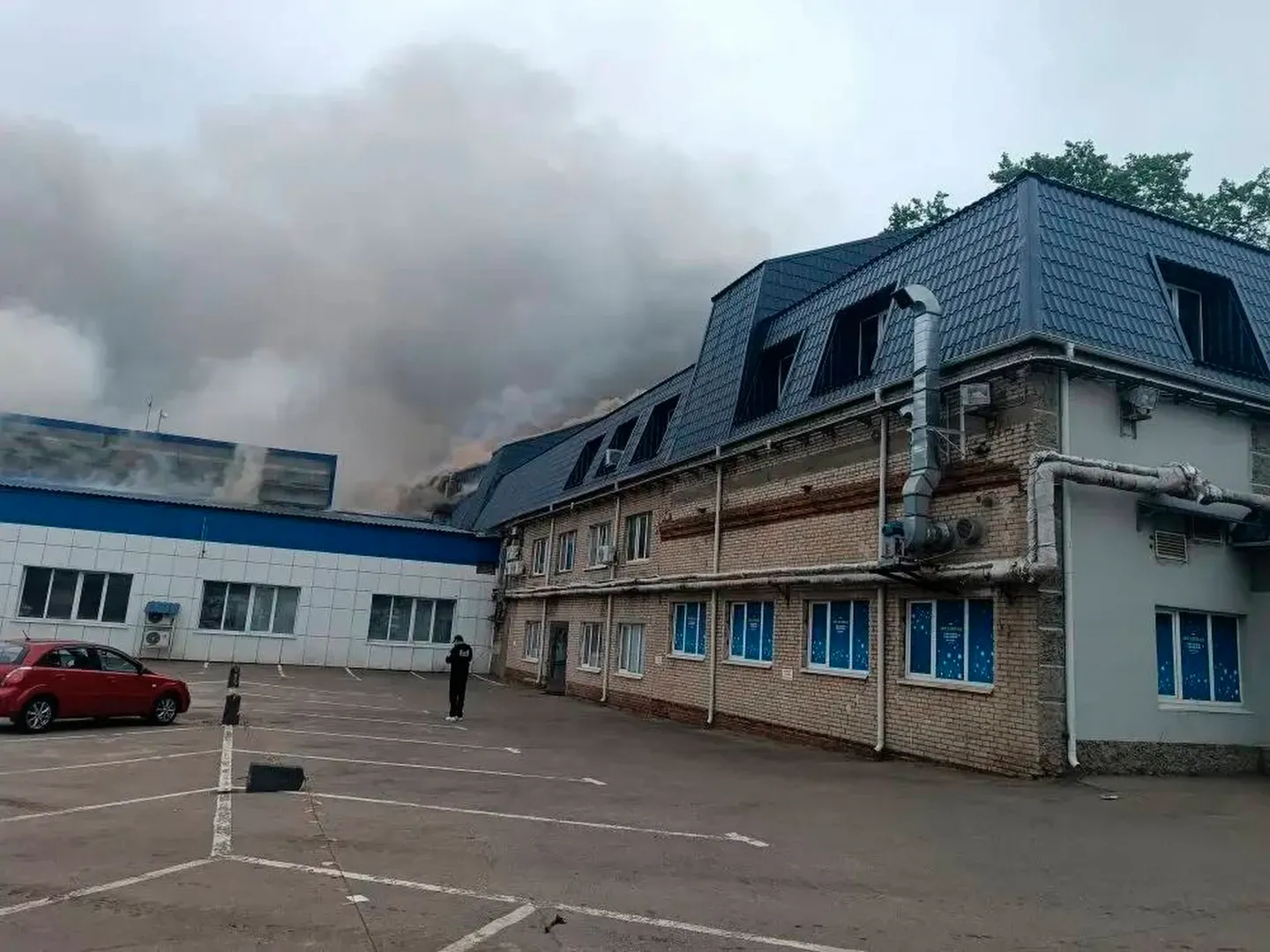 Clouds of black smoke rise over Moscow after Ukrainian drones hit an oil refinery