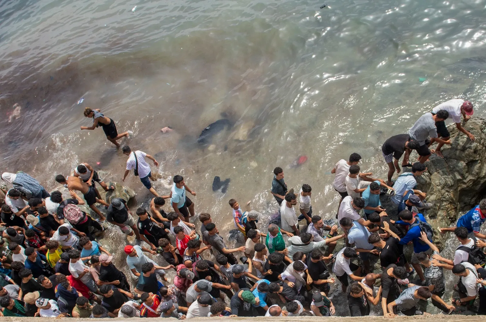 A physics graduate, a soccer player, a teen who couldn’t swim: They died in the Ceuta migrant surge